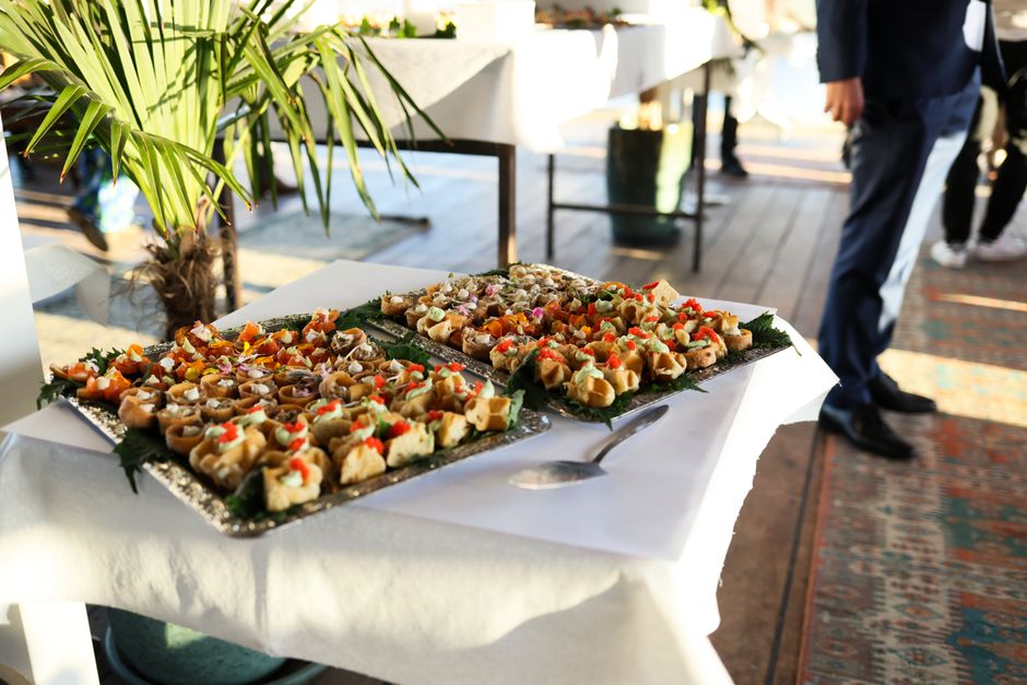 Elegant catered food buffet setup for a corporate event
